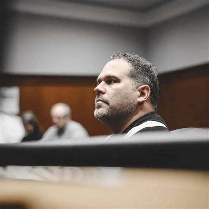 Smiling killer Man murdered exwife's new husband in front of her
